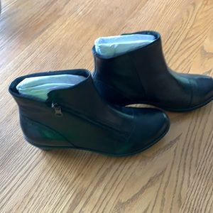 Never worn dansko booties.  Size 40